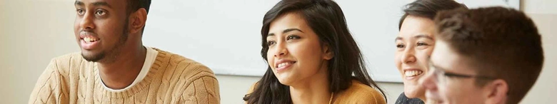 A group of happy-looking students: University of Law's promotional image